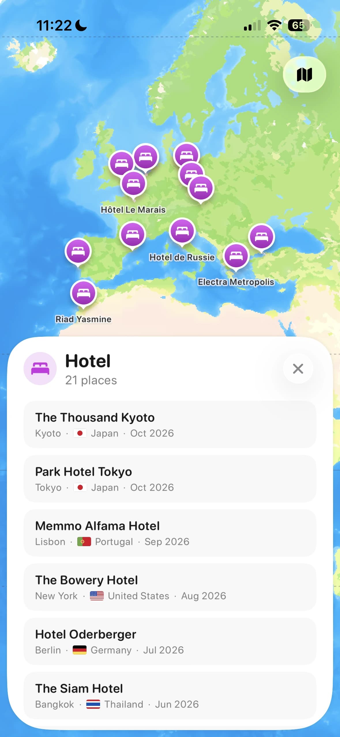 Voyy hotel collection with saved hotels across Europe on the map and a list of stays below.